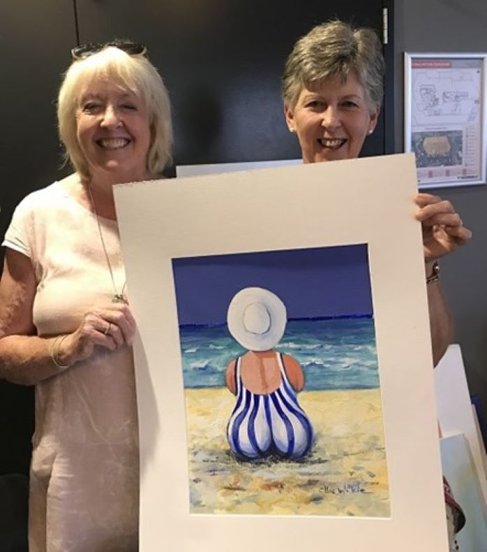 Ellie Wilkie and President Shirley with one of Ellie’s marvellous paintings.